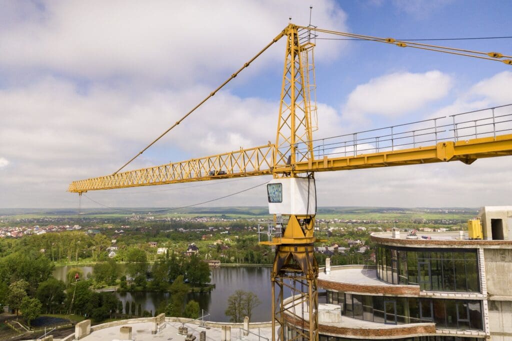 office tall building under construction tower crane